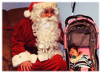 Blind Santa with a sleeping baby